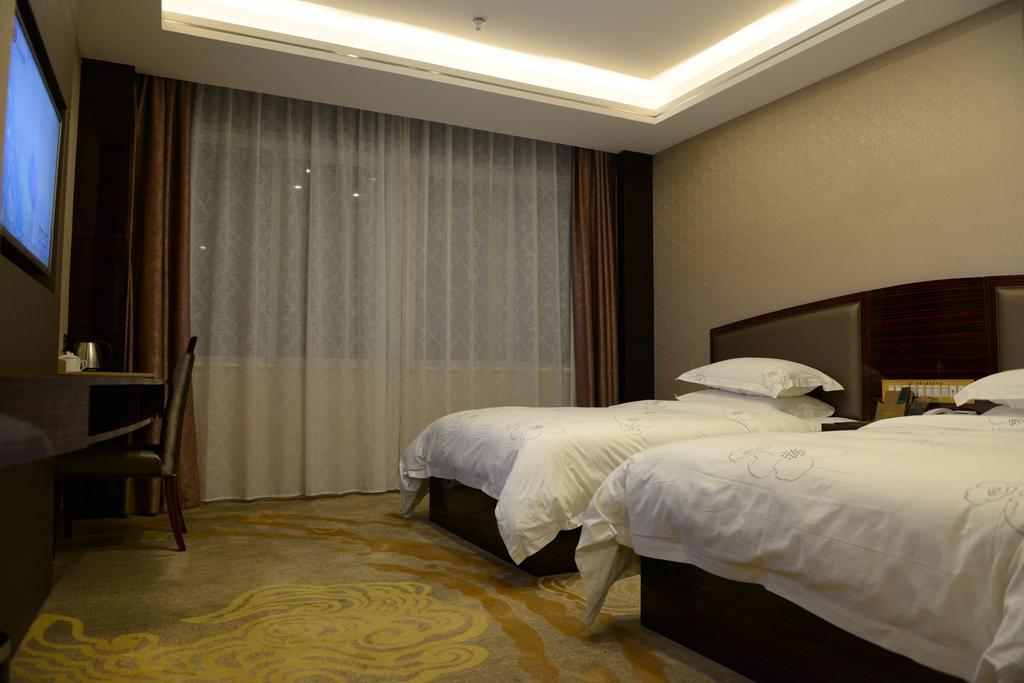 Tie Cheng Hotel Guangzhou Værelse billede